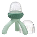 Green baby feeder with clear top on a white background
