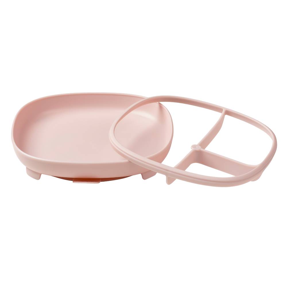 Pink b.box suction plate showing separate divider on a white background
