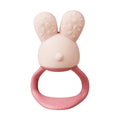 Pink bunny-shaped b.box teething ring on a white background