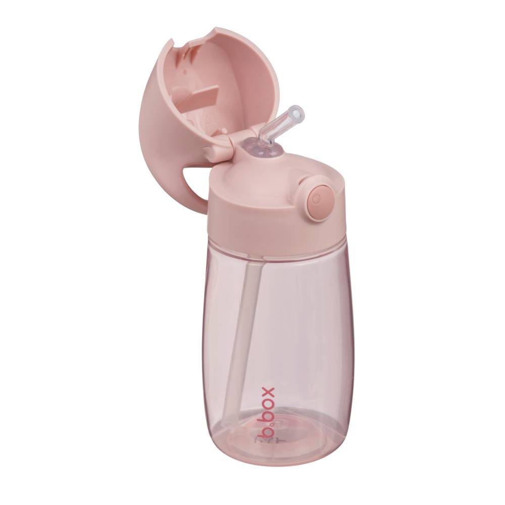 A translucent light pink water bottle with a matching pink lid and straw, shown on a plain white background. The brand name 'b.