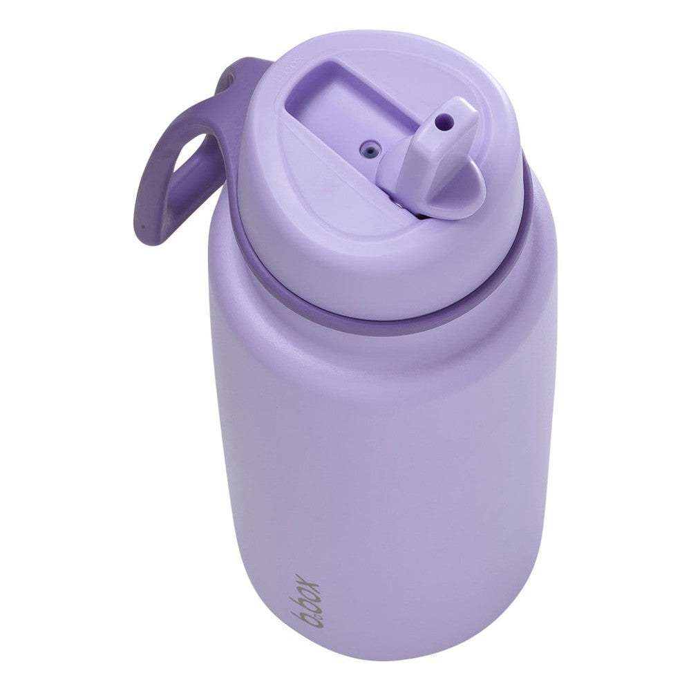 Purple water bottle with a flip straw on a white background