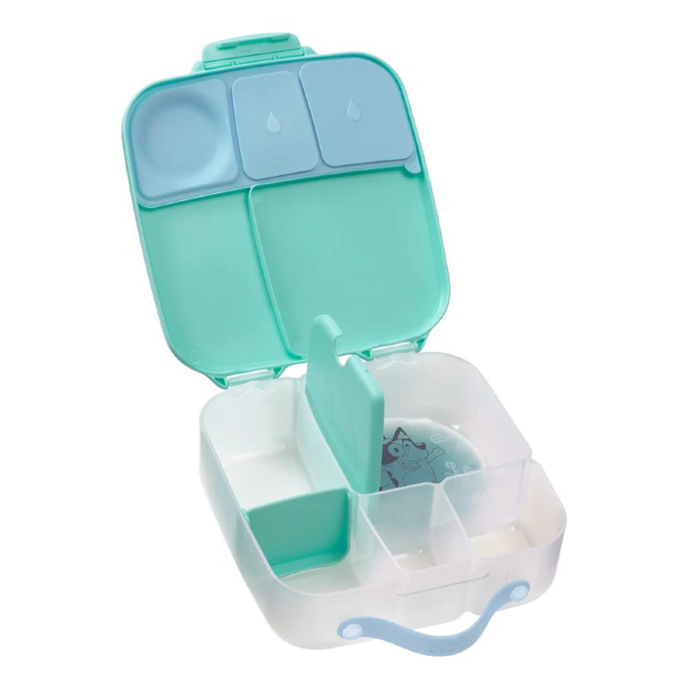 Green and white Bluey lunchbox with a icepack on a white background