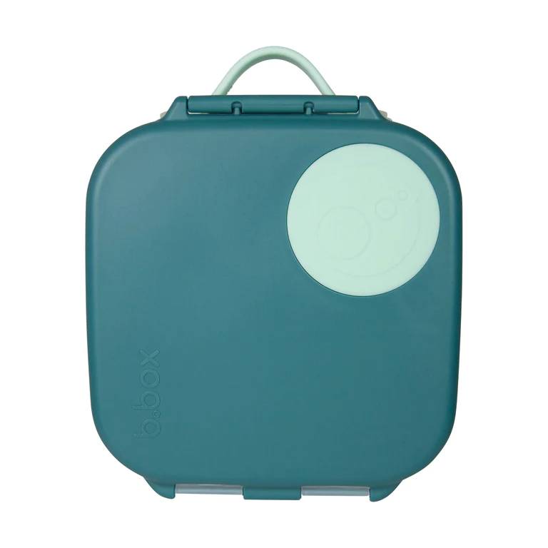 Teal mini lunch box with a circular green handle on a white background