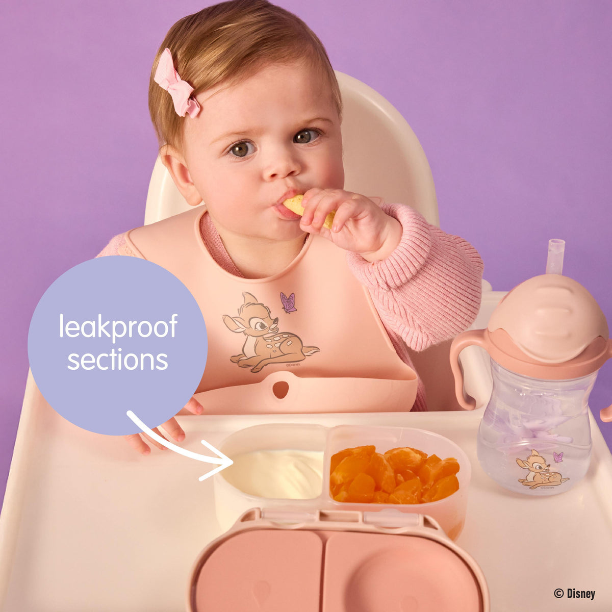 An infographic with a sticker that states 'LEAKPROOF SECTIONS' with a baby in a highchair eating a snack. There is an open snackbox and matching sippy cup in front of her.