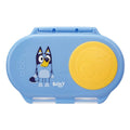 Blue snack container with yellow circular feature and cartoon character on a white background