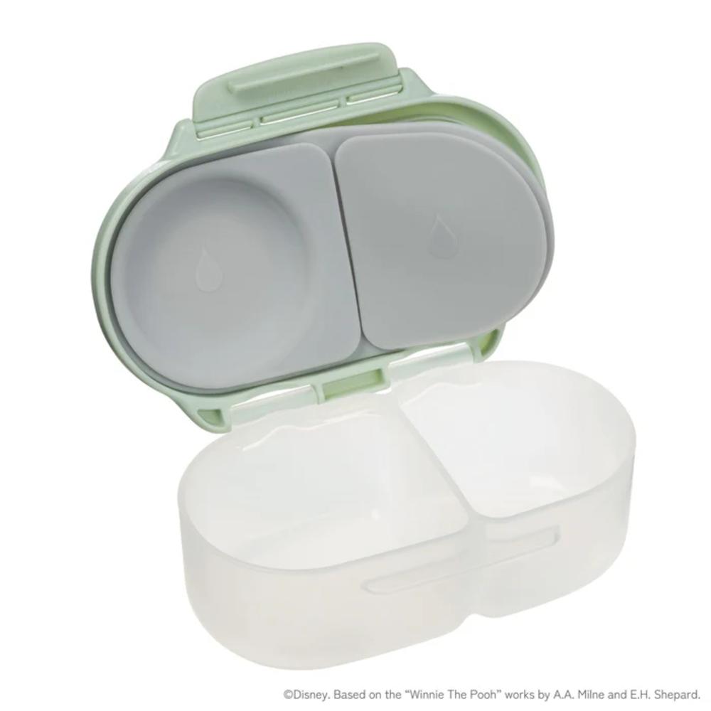Two-tone green and white container with a lid on a white background
