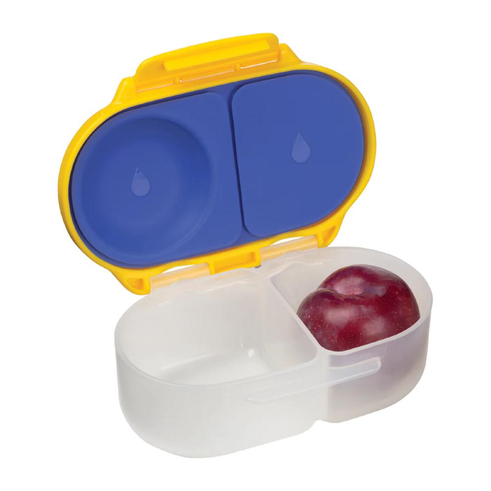 Yellow snack container with two compartments and an apple inside on a white background