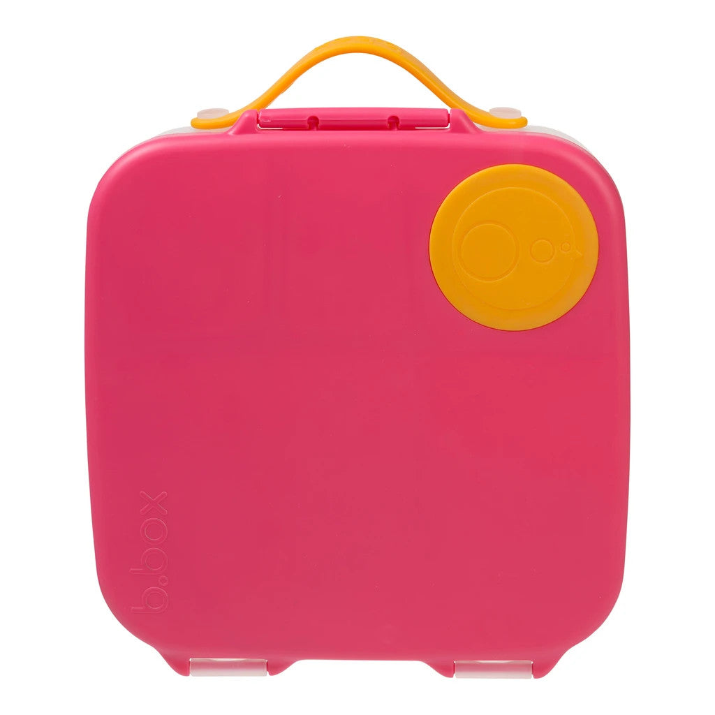 Pink lunch box with orange handle and lid on a white background