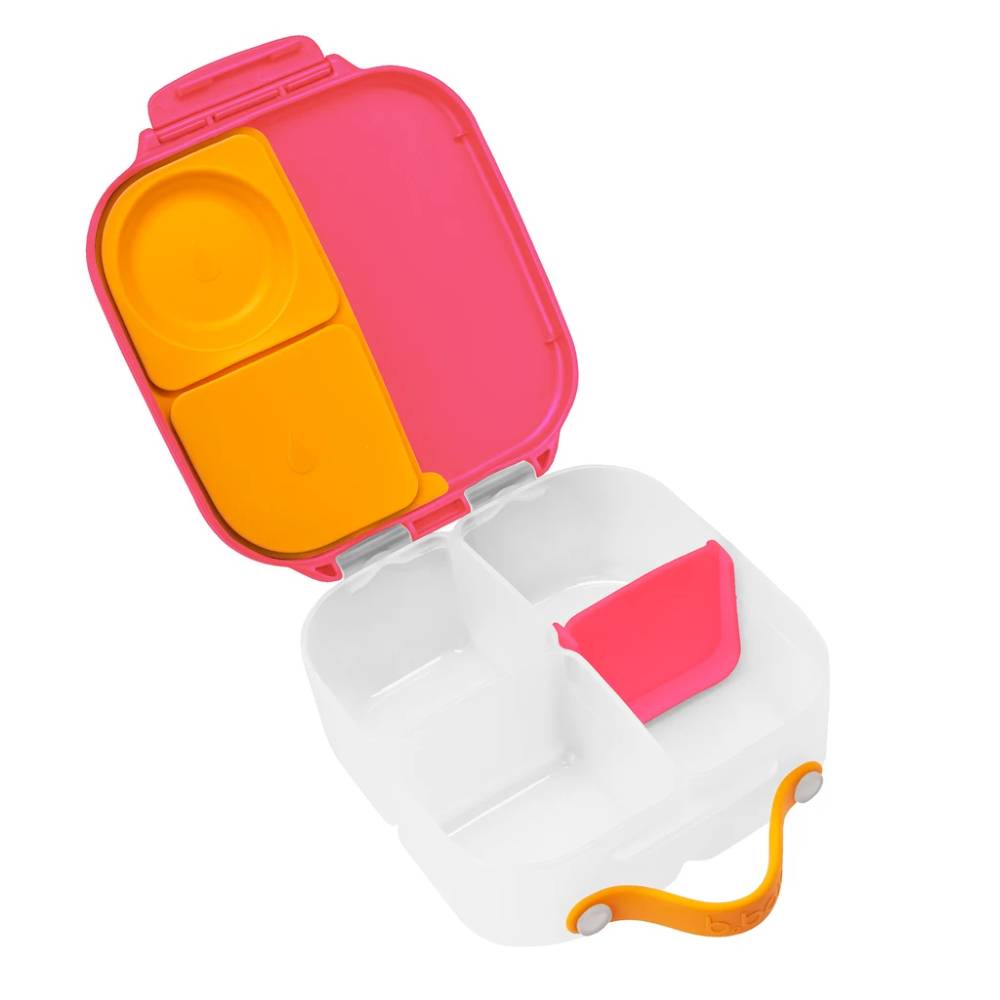 Colorful compartmentalized mini lunchbox with pink, orange, and white sections on a white background