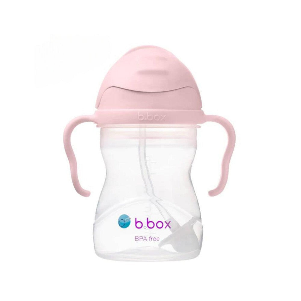Pink sippy cup with clear body on a white background, featuring the b.box logo.
