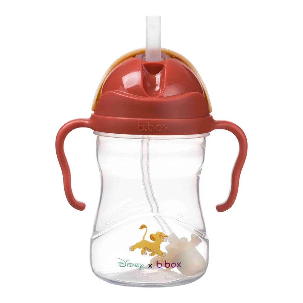 Children's sippy cup with red handle and lid, featuring Disney characters, on a white background.