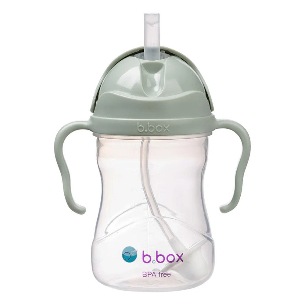 Clear sippy cup with green lid and handles on a white background, featuring the b.box logo.