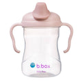 Pink sippy cup with b.box logo on a white background