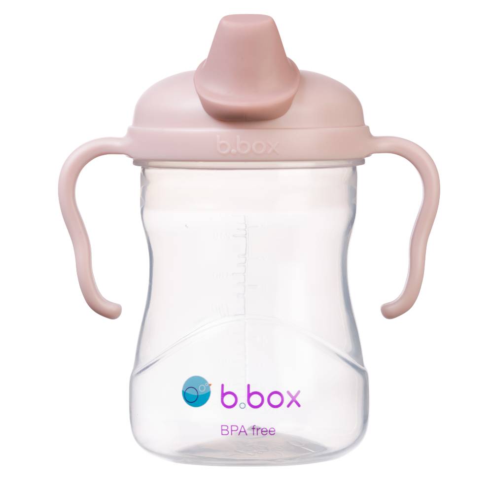 Pink sippy cup with b.box logo on a white background