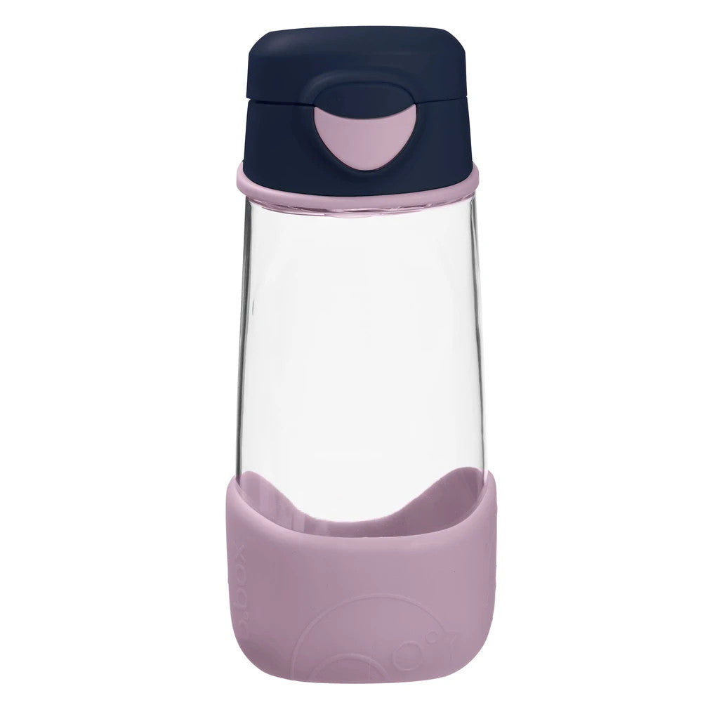 Clear glass water bottle with navy and pink lid and base on a white background