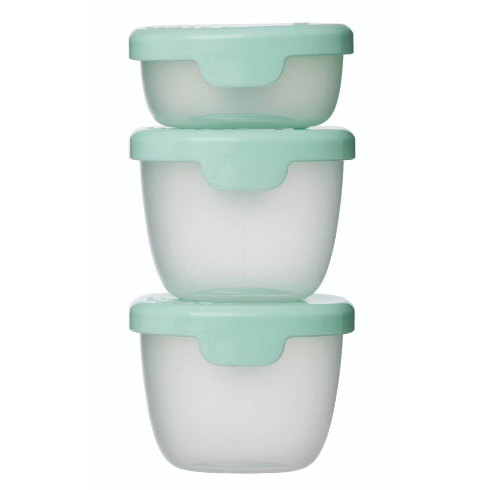Three stacked food containers with green lids on a white background