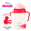 Disney Minnie Mouse themed sippy cup with red handle and straw on a white background