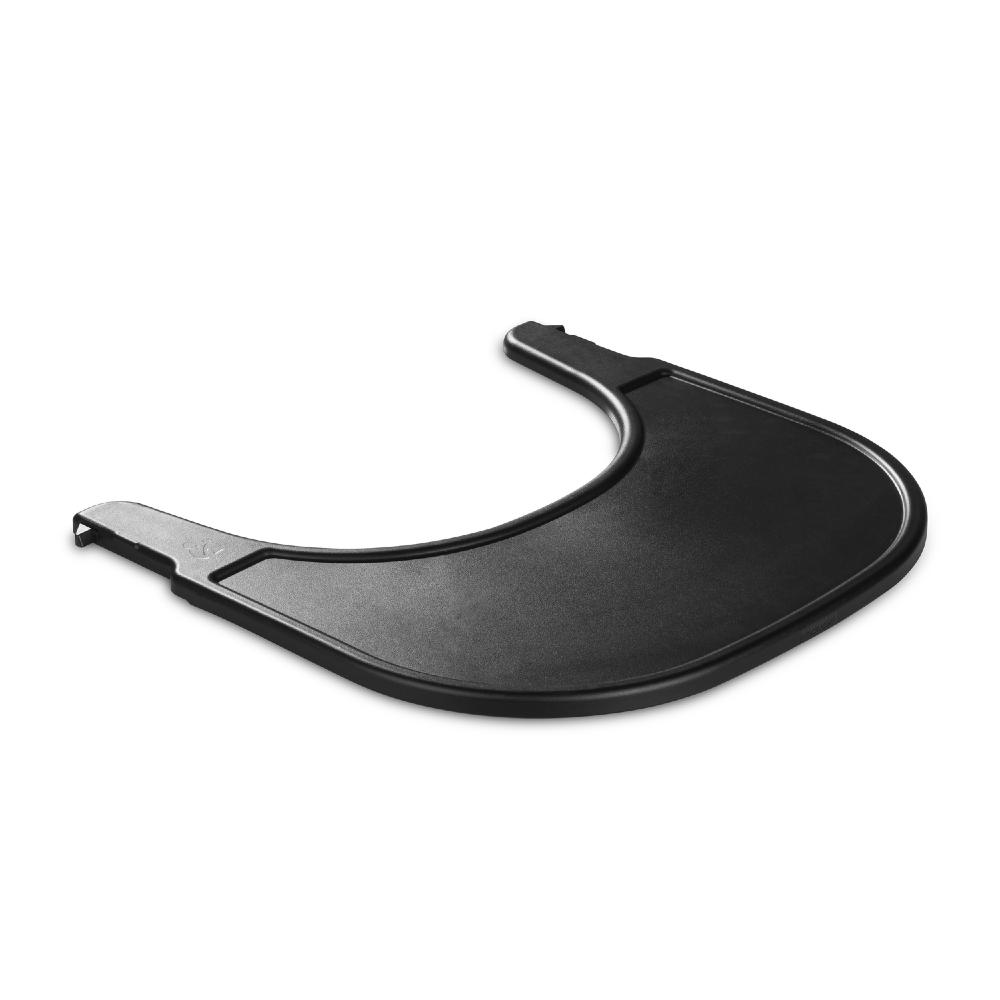 Black plastic Hauck High Chair tray on a white background