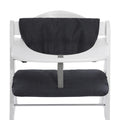 White high chair with black cushion on a white background