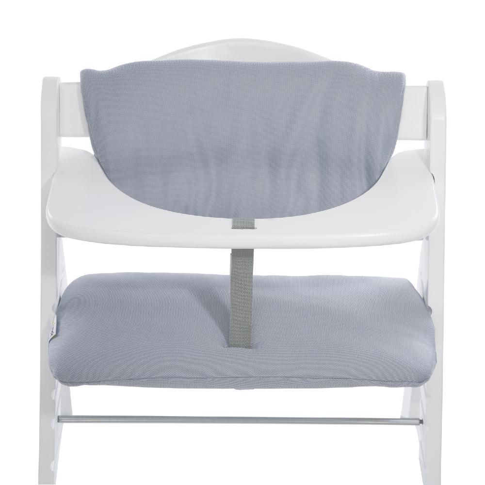 White chair with grey cushion on a white background