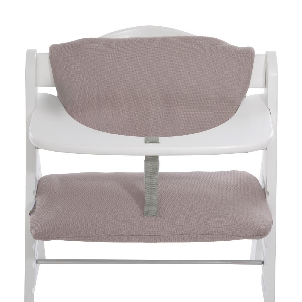 White high chair with beige cushion and straps on a white background