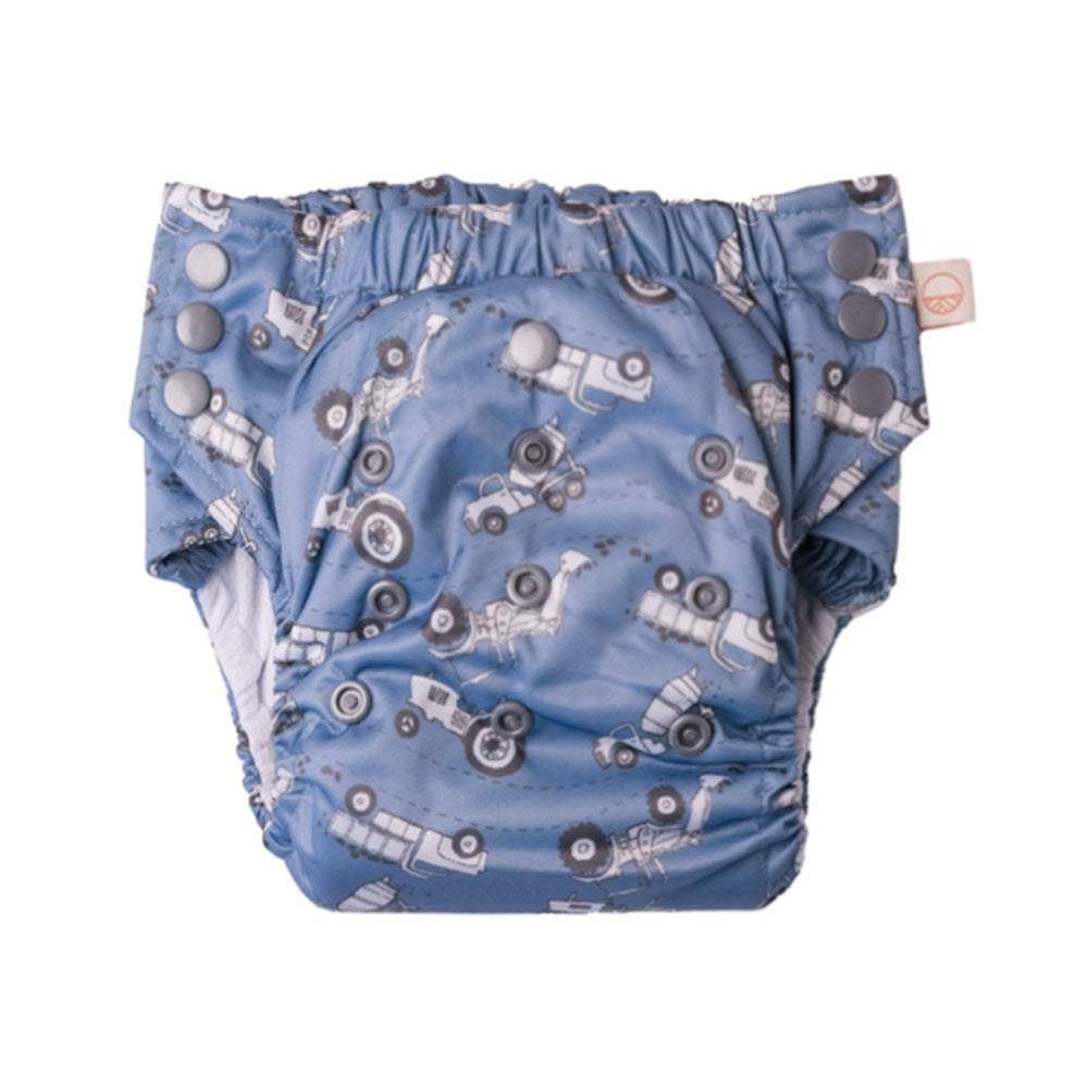 Blue baby diaper with truck pattern on a white background