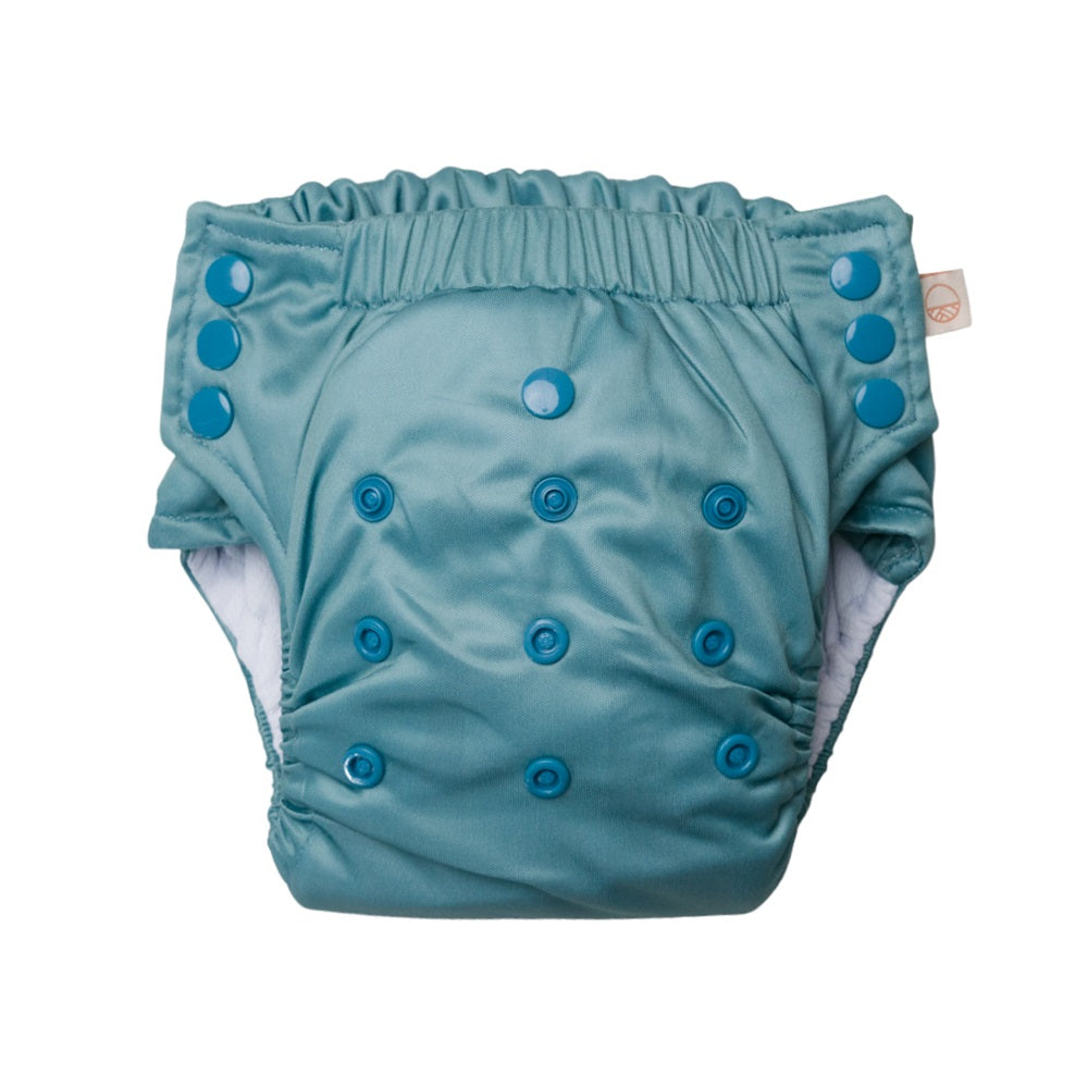 Reusable Nappy pant in blue with snaps on a white background