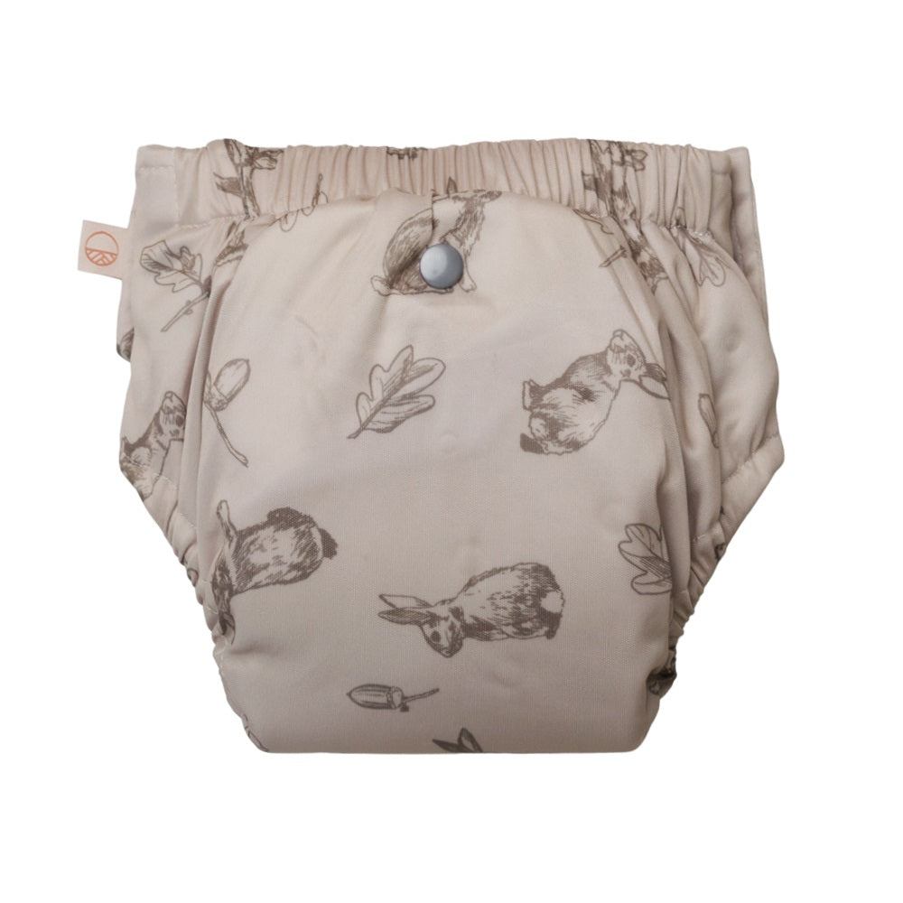 Beige diaper with animal prints on a white background