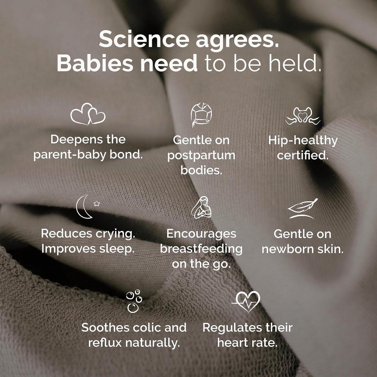 A close-up of soft taupe-beige baby clothing fabric with white text and icons listing benefits such as deepening the parent-baby bond, gentle on postpartum bodies, hip-healthly certification, reduced crying, breastfeeding support, and soothing colic and reflux.