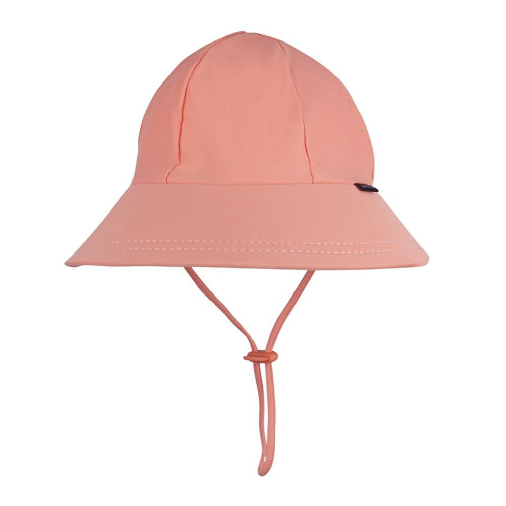 Swim Ponytail Bucket Sun Hat - Peach on a white background