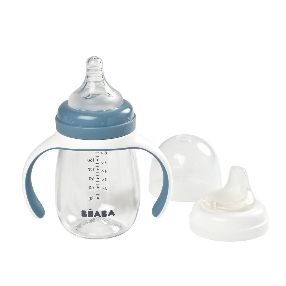 Baby bottle with blue accents and a separate nipple on a white background