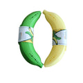 Yellow and green Appetito banana containers against white background.