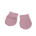 Pink merino Mittens on a white background