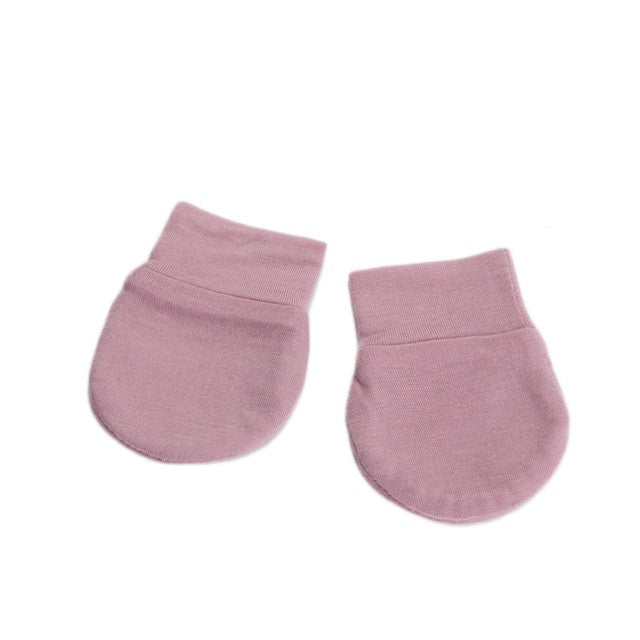 Pink merino Mittens on a white background