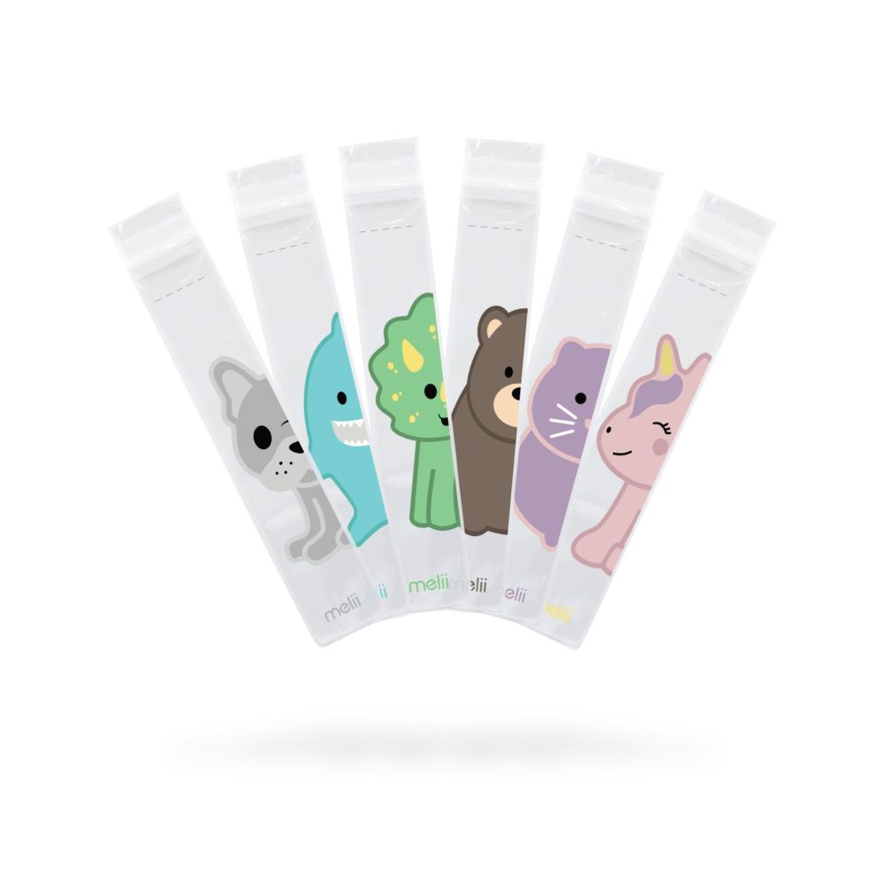 Set of six ice block moulds with cartoon animal designs on a white background