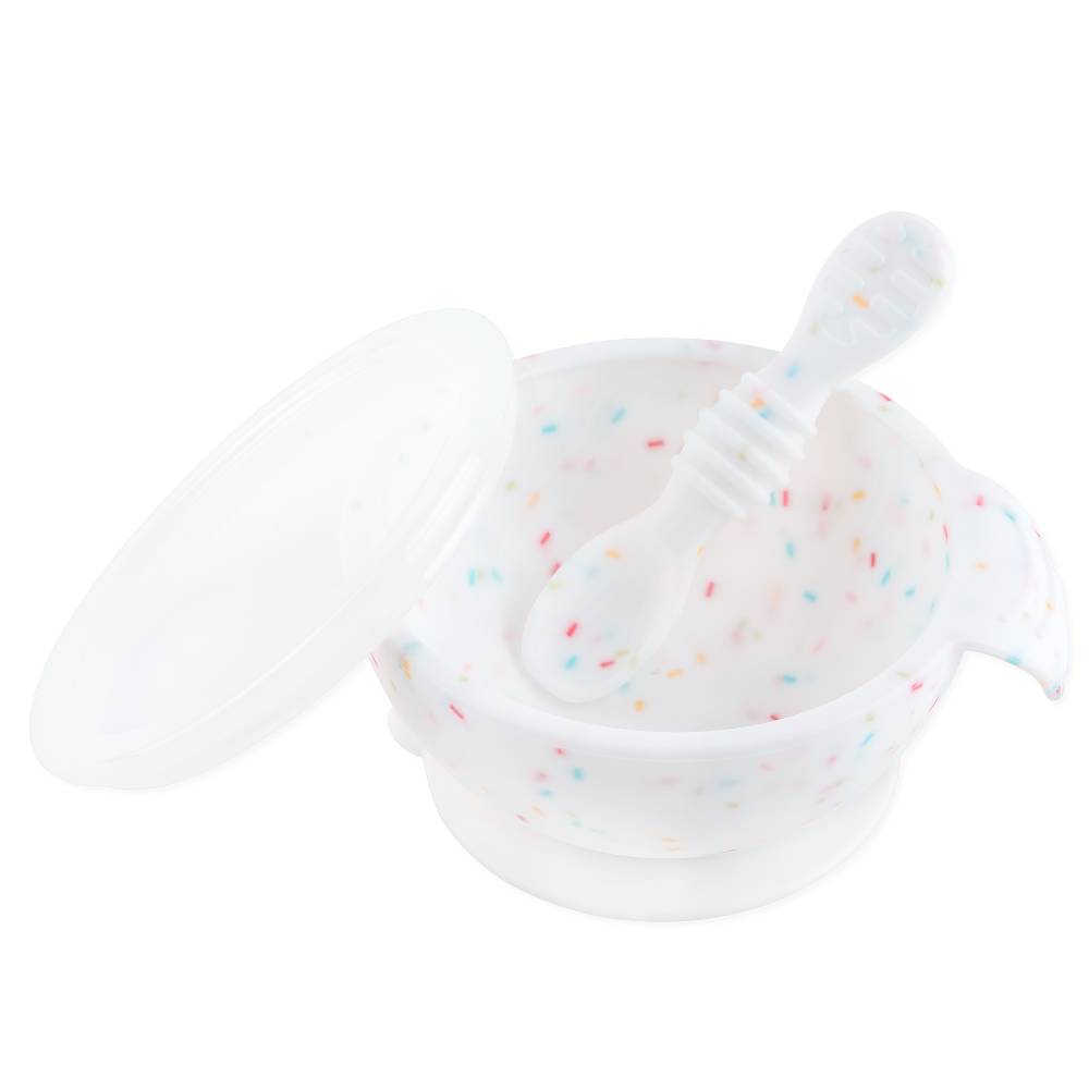 White with sprinkles Silicone Feeding Bowl with lid and silicone spoon on a white background