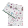 A light grey and floral bumkins splat mat with sage green piping on  a white background 