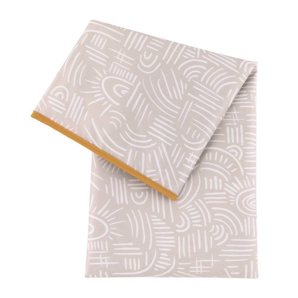 A beige with white patterned bumkins splat mat with mustard piping on a white background