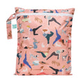 Bumkins wet bag with a yoga design on a white background