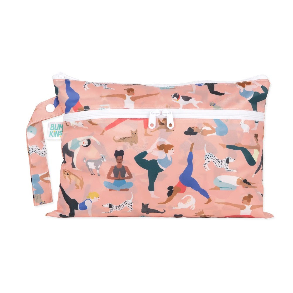 A light pink Wet and dry clutch with pictures of women and dogs in Yoga poses and a visible brand tag on a white background