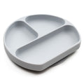 A grey bumkins silicone plate with three sections on a white background