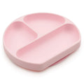 A pink bumkins silicone plate with three sections on a white background 