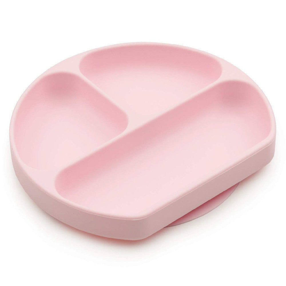 A pink bumkins silicone plate with three sections on a white background 