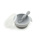 Grey Silicone Feeding Bowl with lid and silicone spoon on a white background