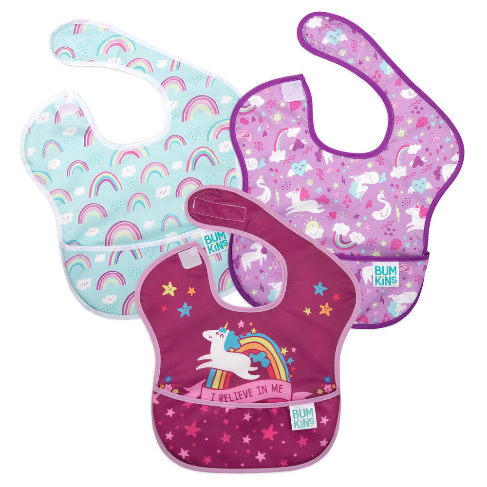 3 waterproof Bumkins bibs in 3 rainbow and unicorn on a white background