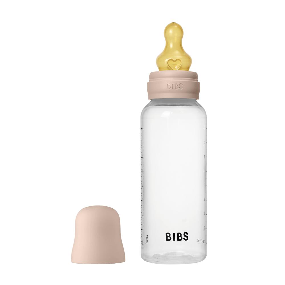pink latex and plastic anti colic baby bottle