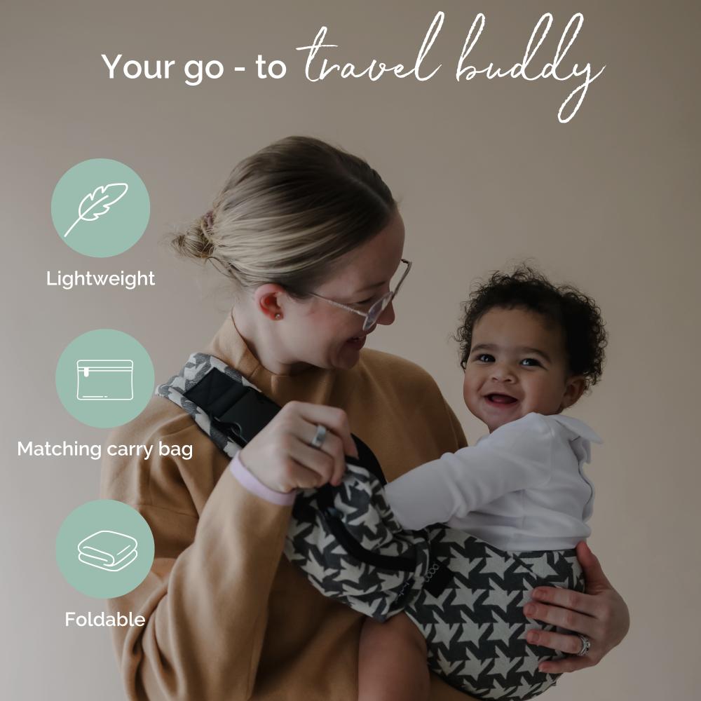 Woman holding a baby with text and icons about a product's features on a beige background