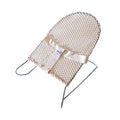 Natural coloured baby bouncer on w hit background.
