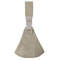 Olive green toddler hip carrier with a strap on a white background