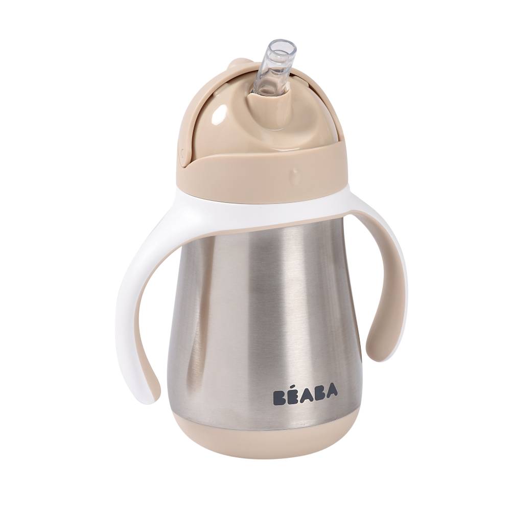 Children's stainless steel sippy cup with beige lid and white handle on a white background, featuring the BEABA brand.